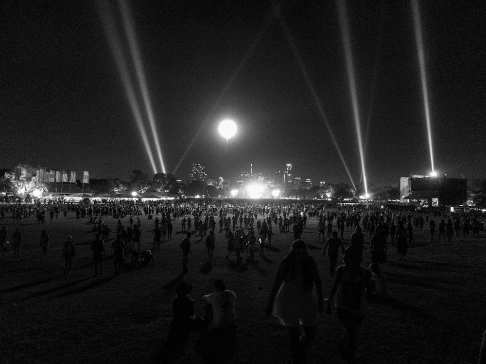 crowd of people in park at night