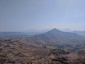 A scenic view of renewable energy infrastructure blending with the natural landscape of the reservation.