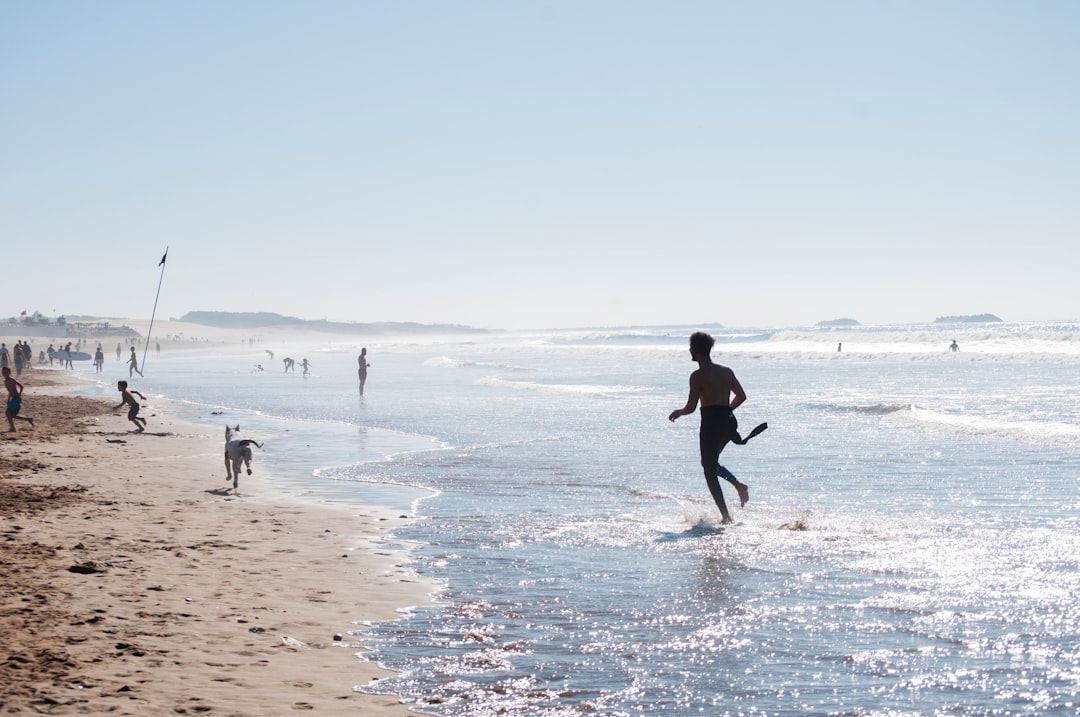 man standing on shore