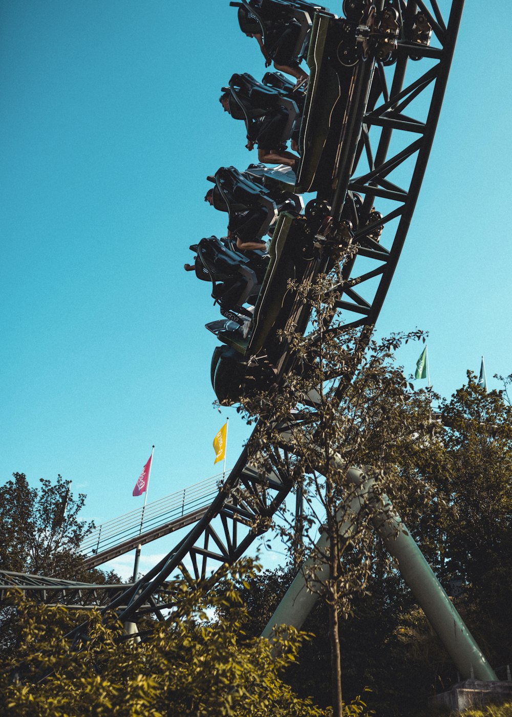 black roller coaster during daytime