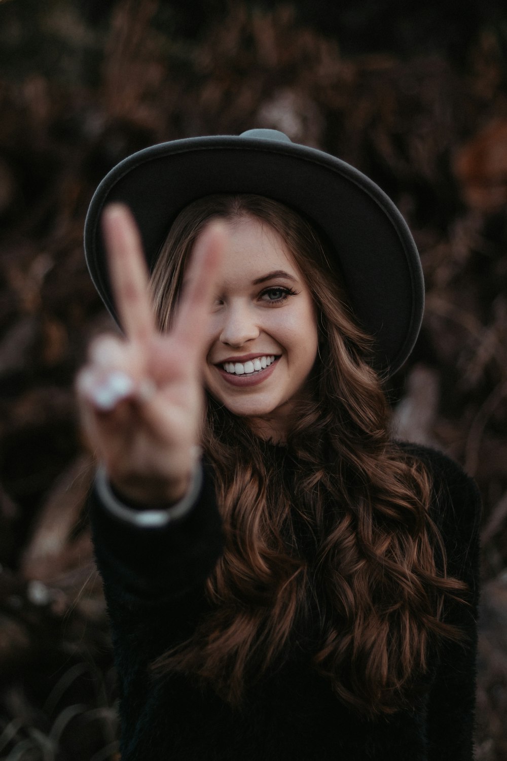 woman in black long-sleeved shirt