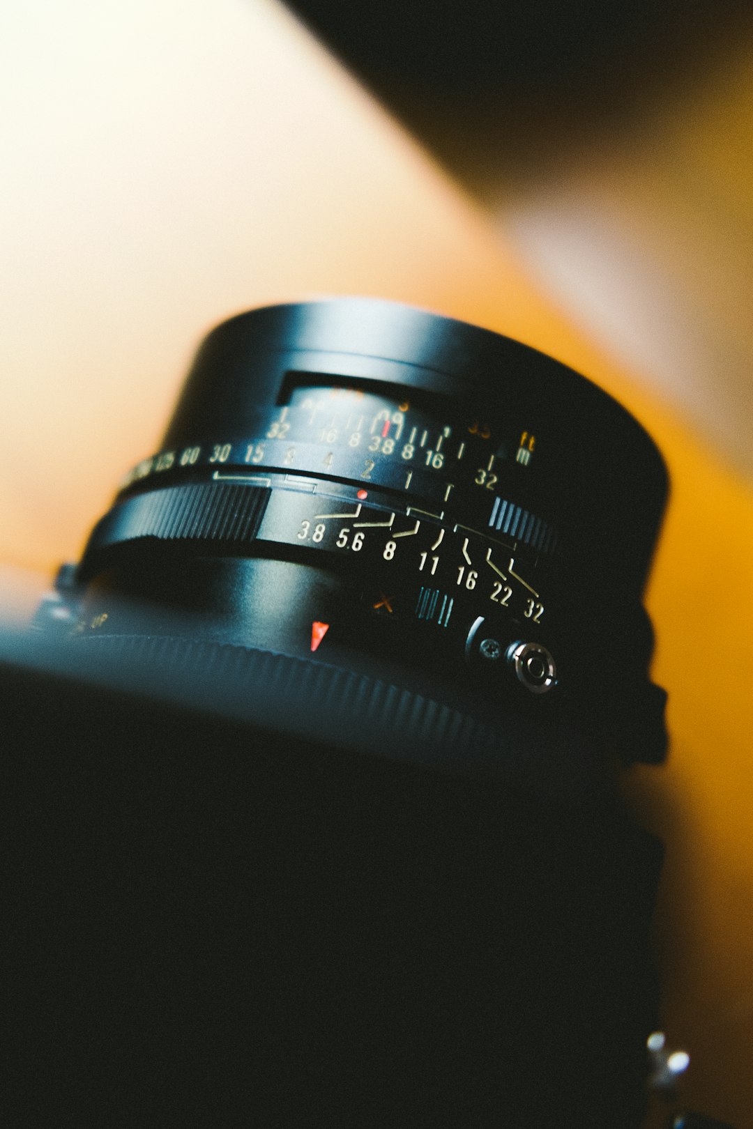 shallow focus photo of black camera lens