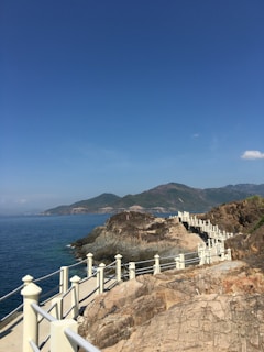 A scenic hiking trail along cliffs with panoramic views of the Atlantic Ocean