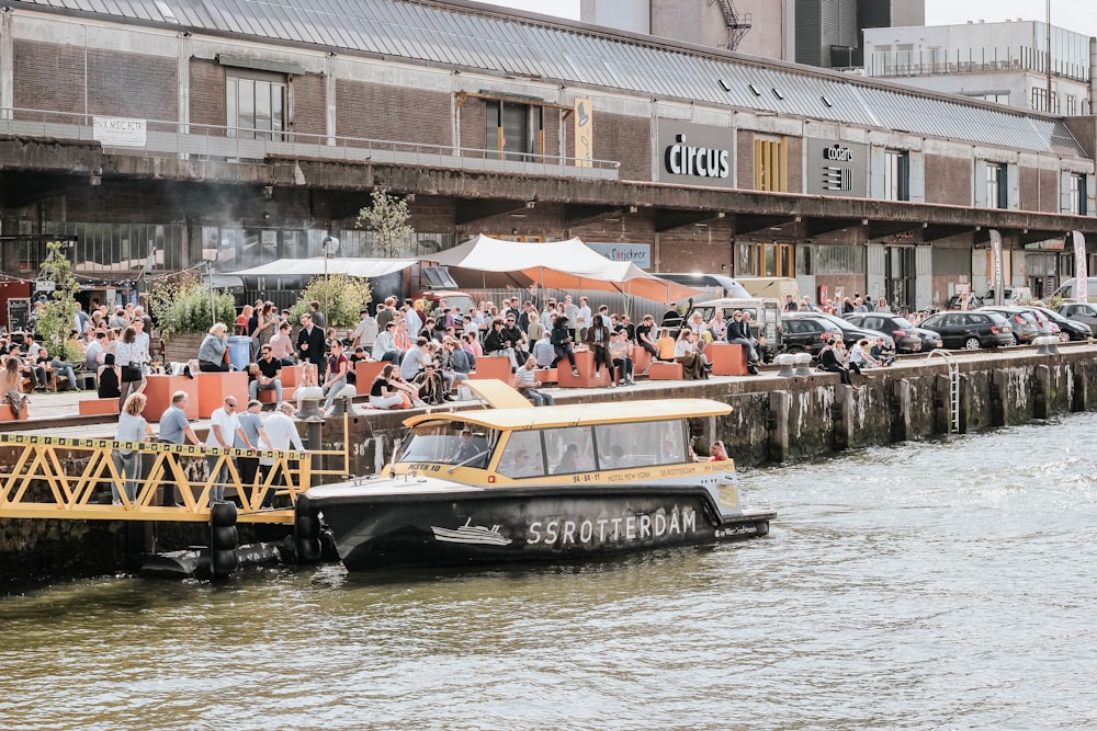 yellow and black passenger boat