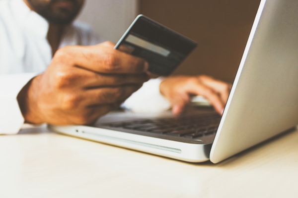 Stock photo of the Business Man with a credit card by rupixenby rupixen