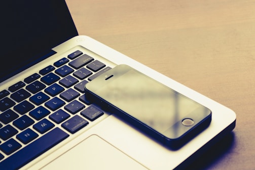 space grey iPhone 5s on MacBook Pro