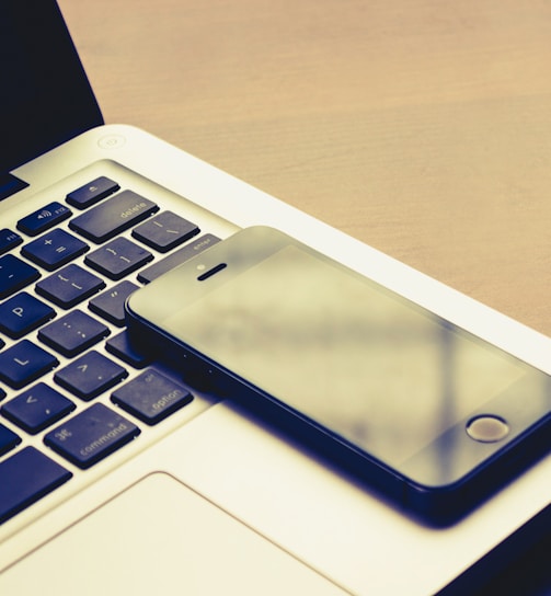 space grey iPhone 5s on MacBook Pro