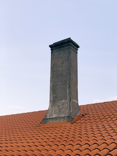 a chimney on the roof of a house