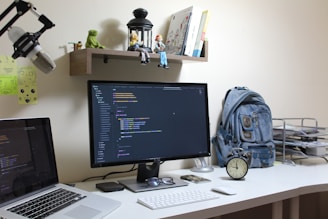 turned-on flat screen computer monitor