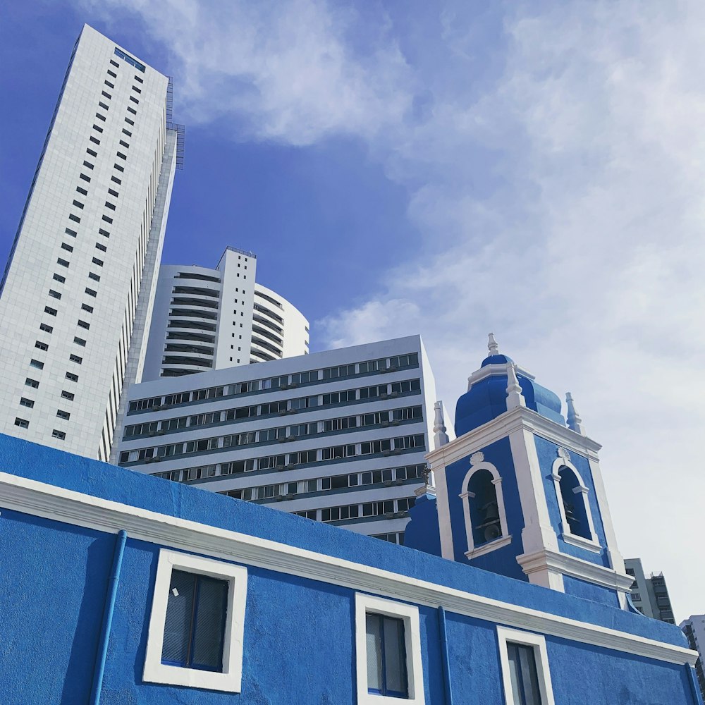 architectural photo of white and blue building