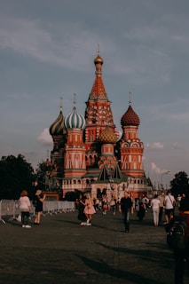 a group of people standing in front of a building
