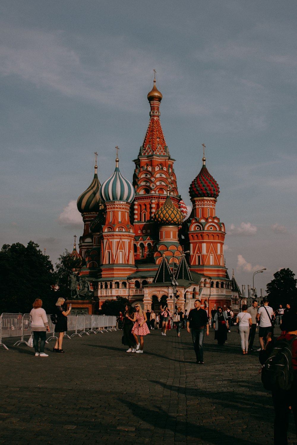 a group of people standing in front of a building