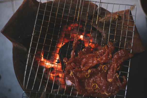 raw meta on grill