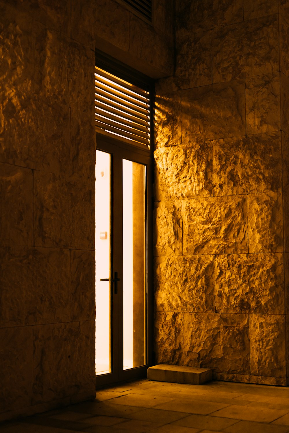 white wooden-framed clear glass door