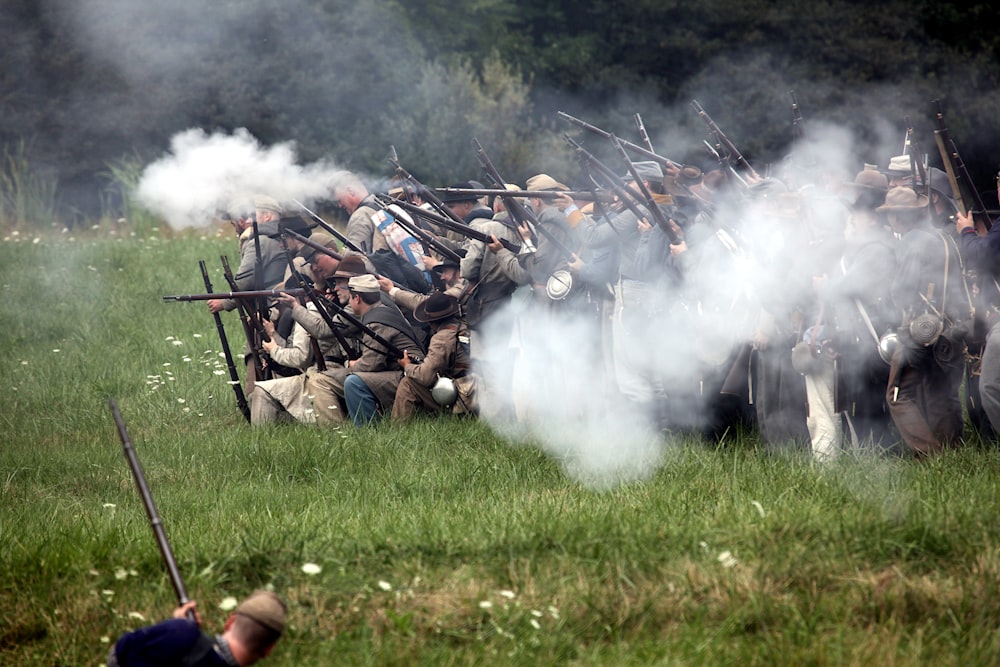 men holding rifles