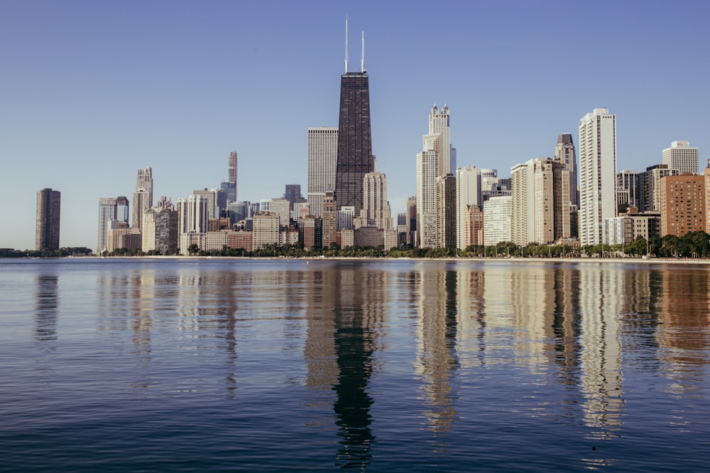 body of water near buildings at daytime