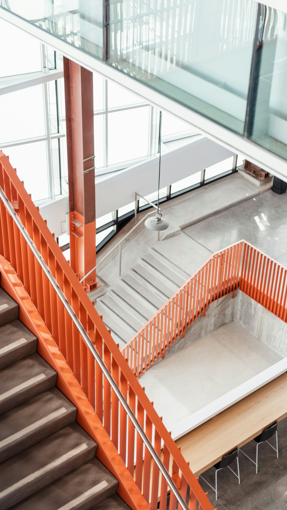 orange and white stair railings