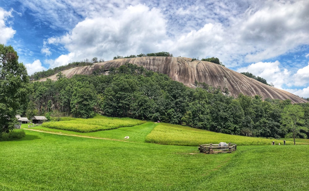 mountain under cloudy sky during daytime