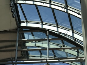 A beautifully designed glass enclosure for outdoor spaces.