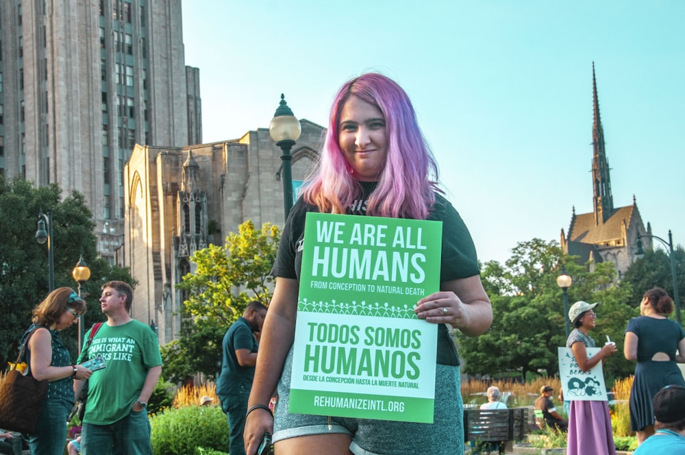 we are all humans signage