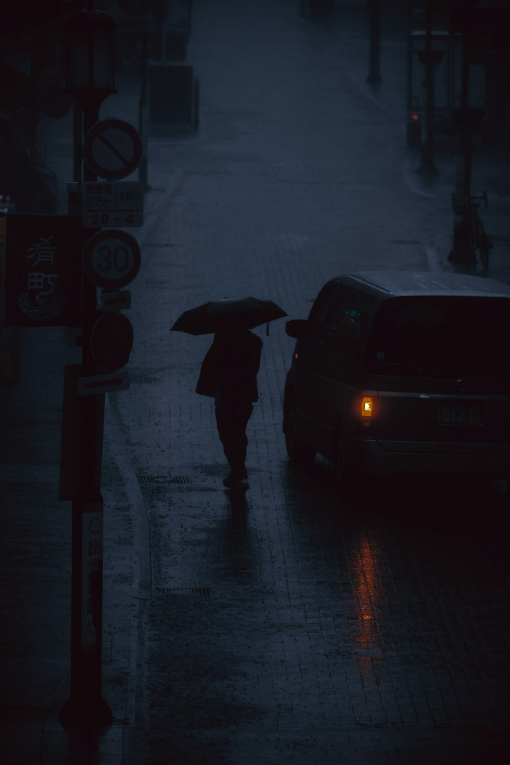 man standing near vehicle