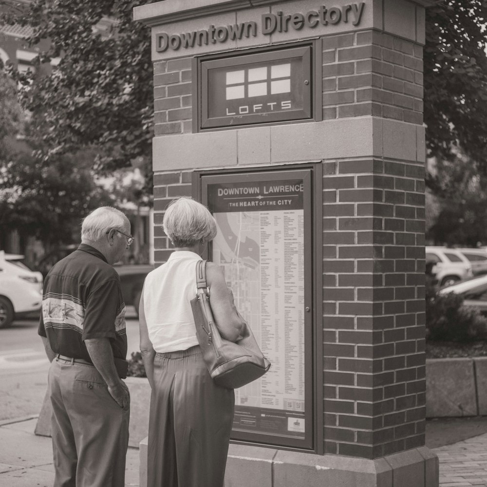 two people looking at map