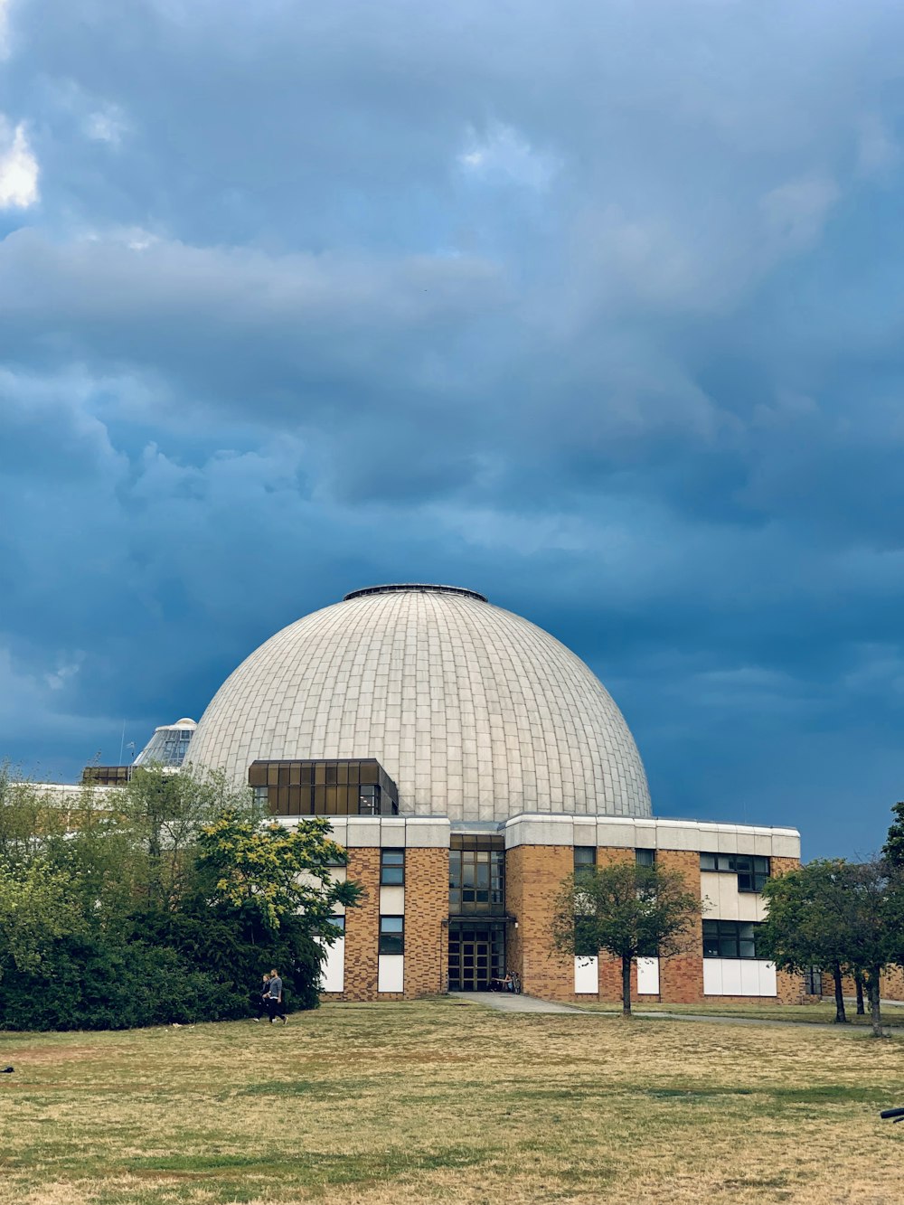 dome building under dark clouds