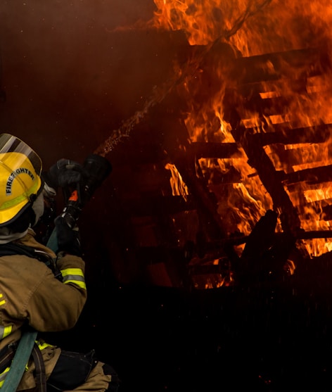 firefighter inside burning house