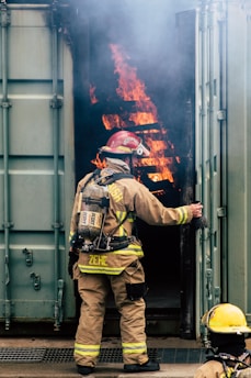 firefighter on intermodal container