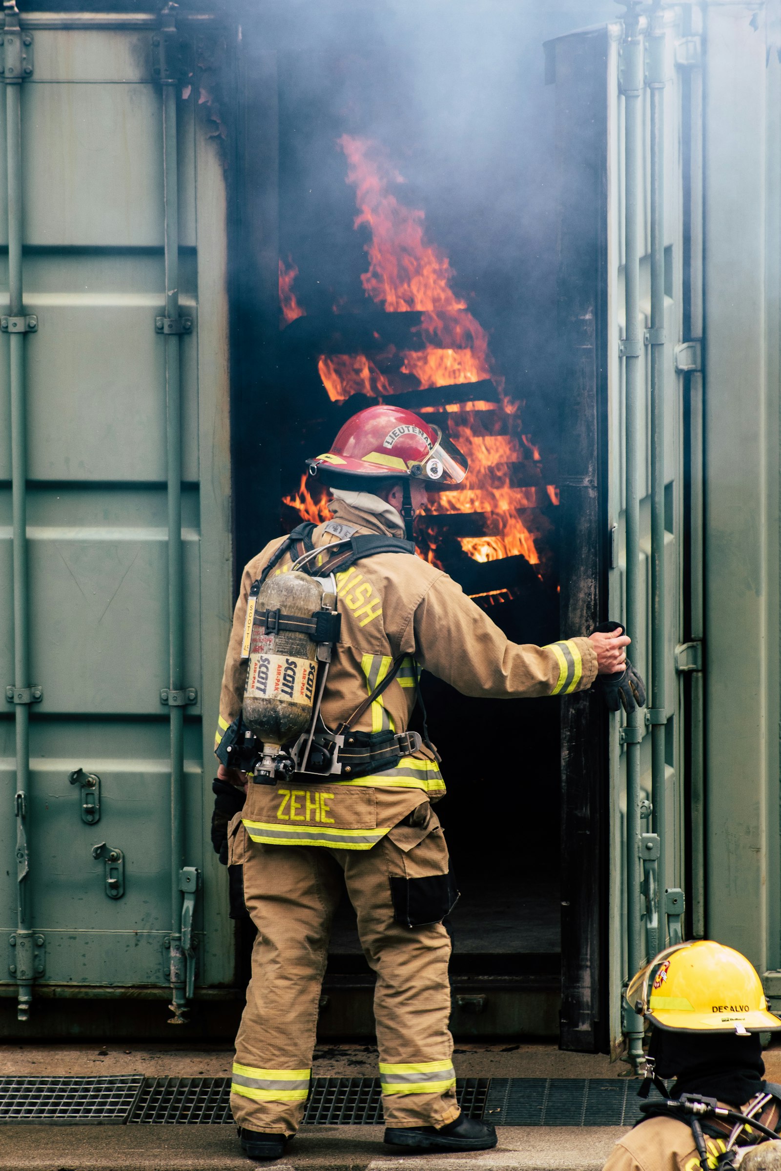 Canon EF 75-300mm f/4-5.6 sample photo. Firefighter on intermodal container photography