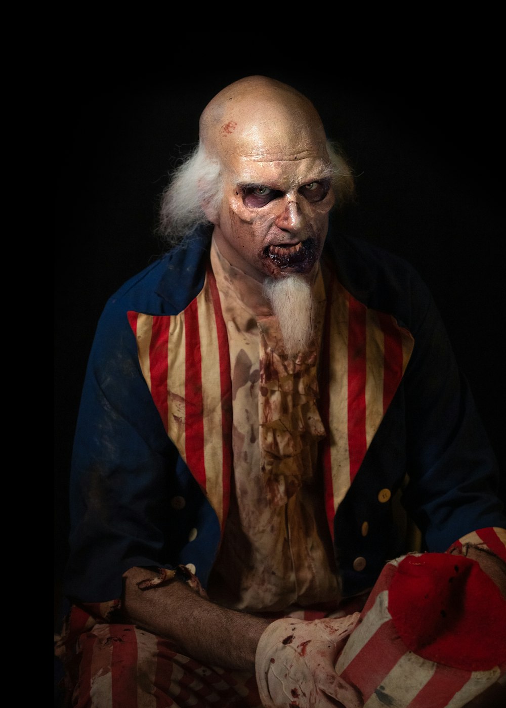 man in red, blue, and white coat horror character