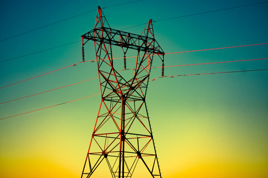 Electrical distribution line strung across the Laikipia countryside at golden hour