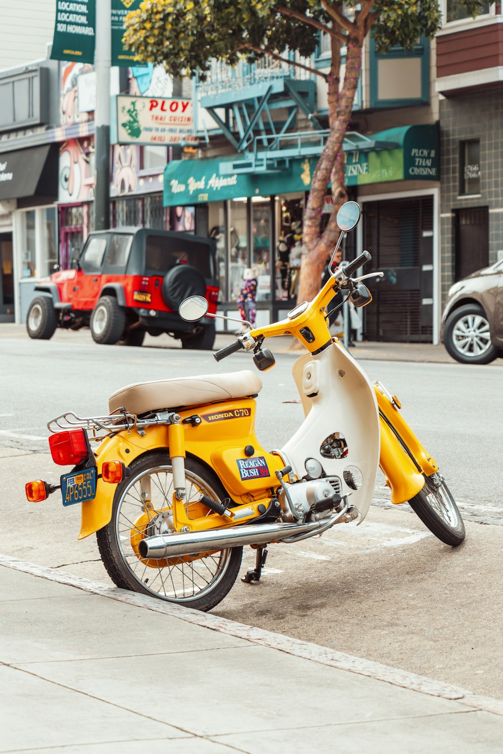 parked motorcycle on sidewalk