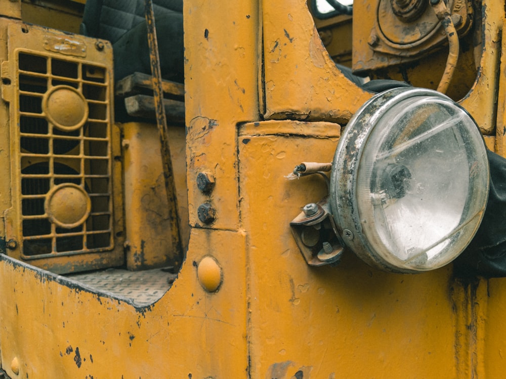 yellow vehicle showing headlight