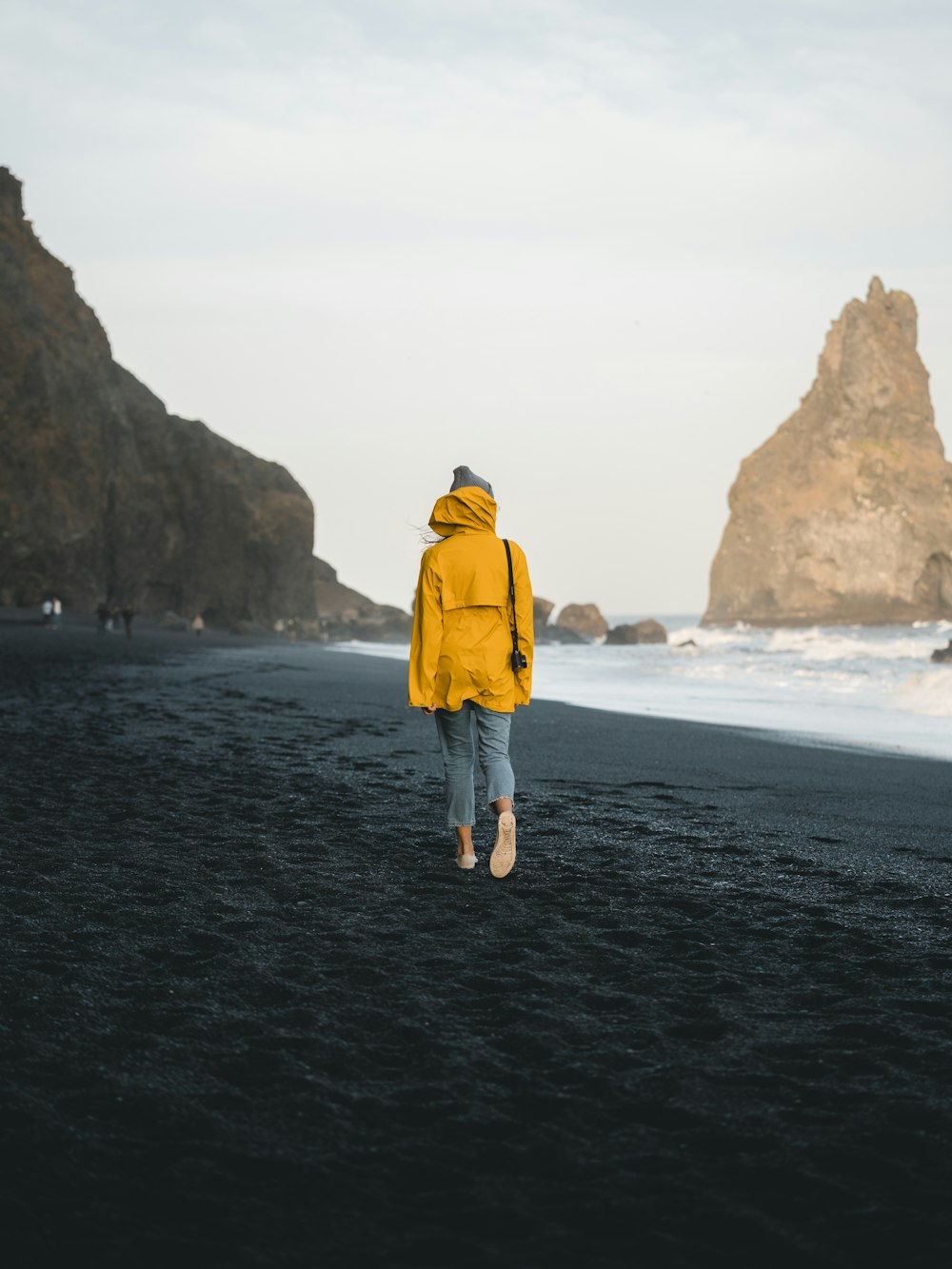 woman wearing yellow hoodie