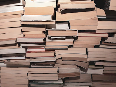 A vibrant stack of gently used textbooks ready for bulk shipment to schools.