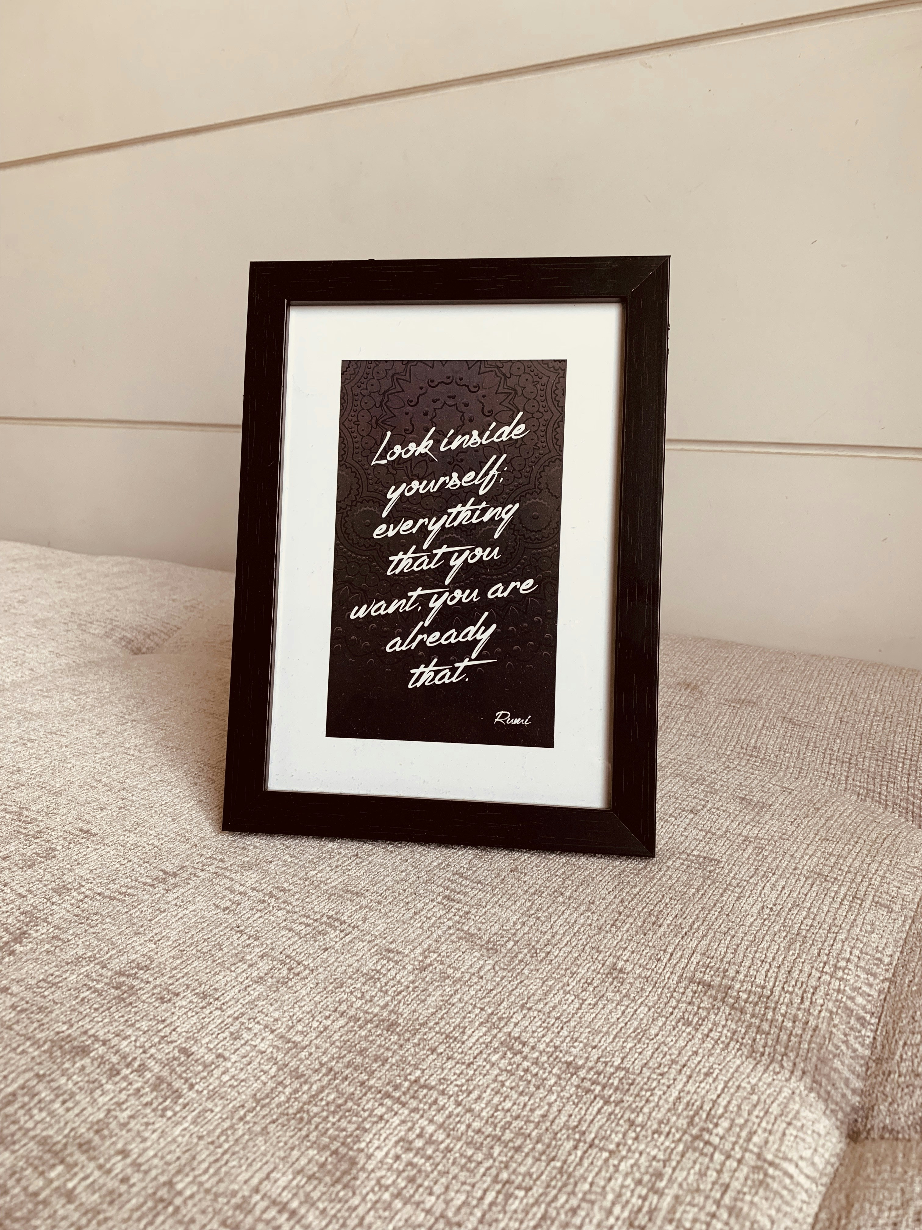white and black photo frame with quote