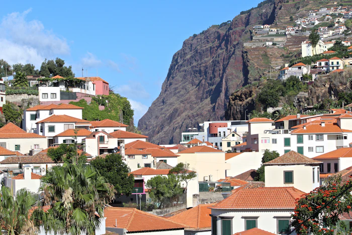 View over a Portuguese city with mountains behind