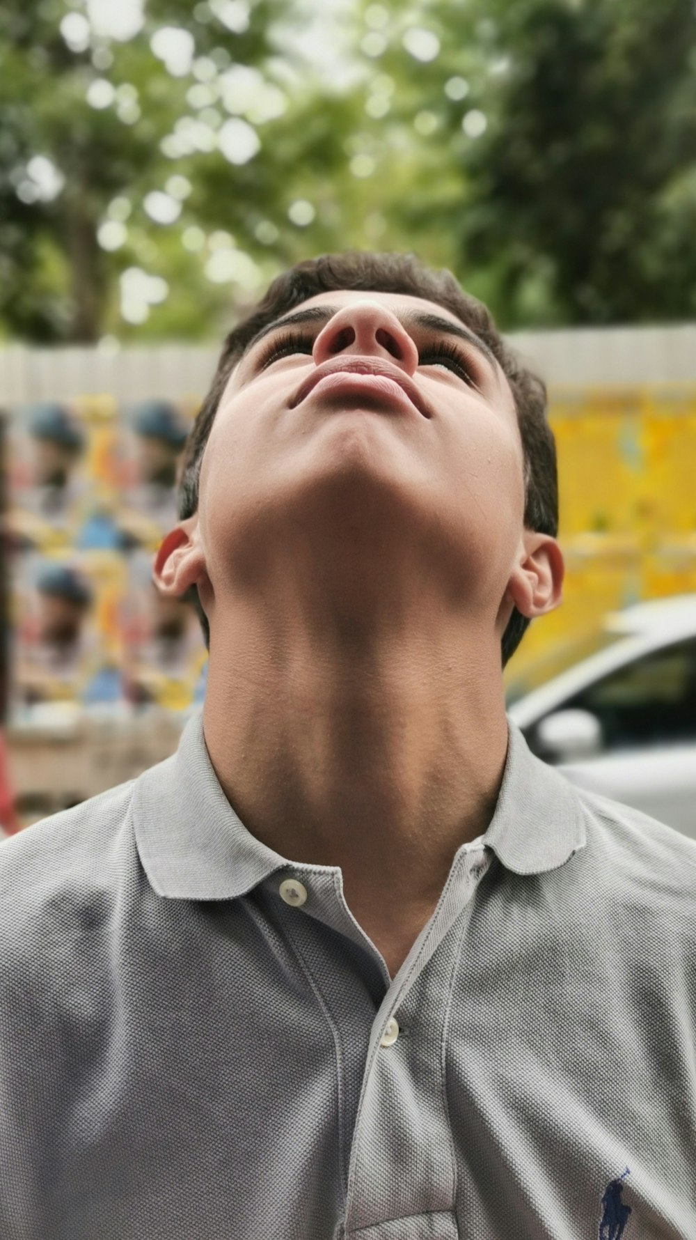 man looking at ceiling