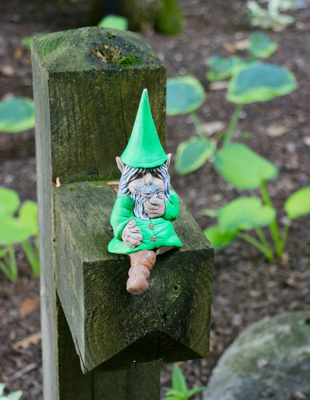 green gnome figure