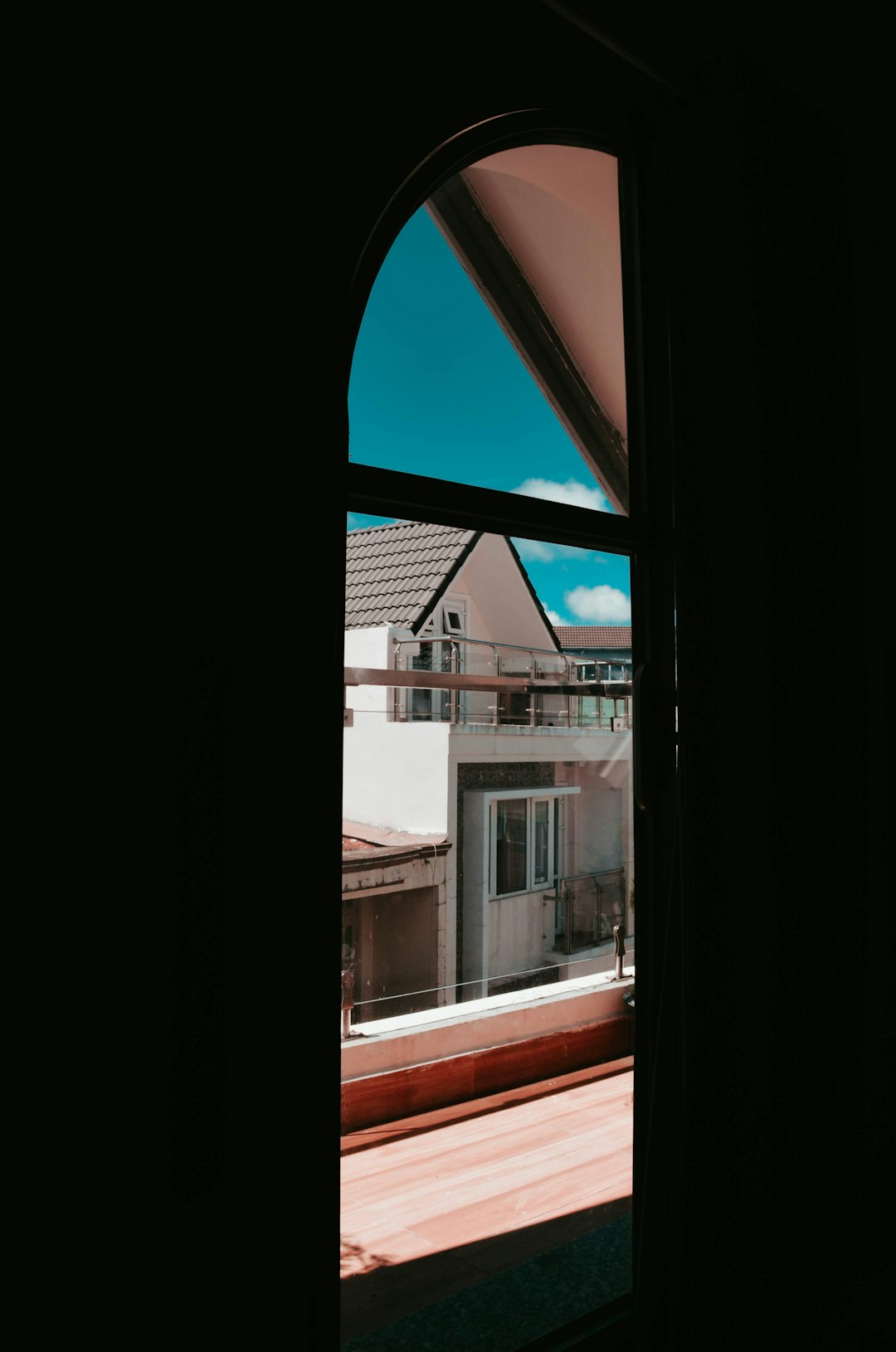 white 2-storey house outside window