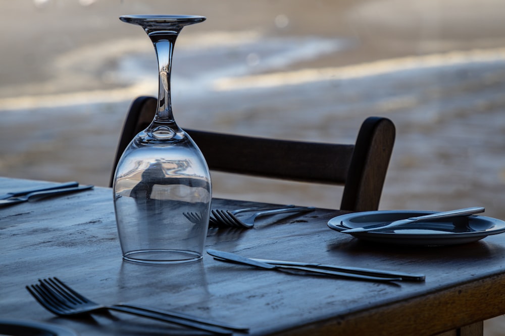 clear wine glass between forks