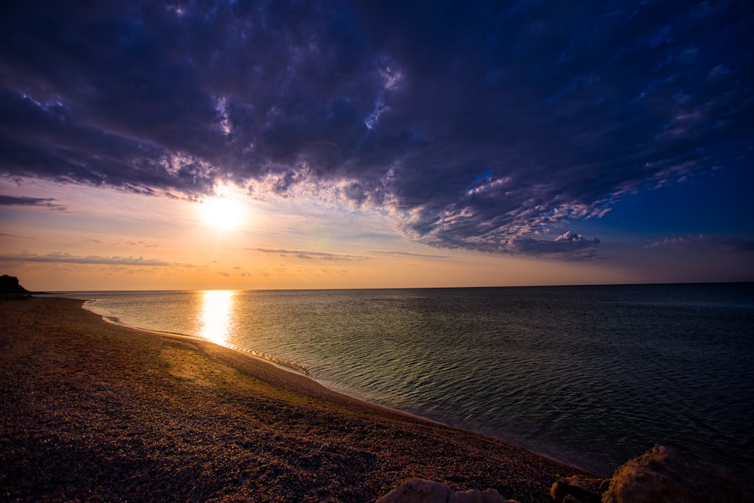 calm body of water during daytime