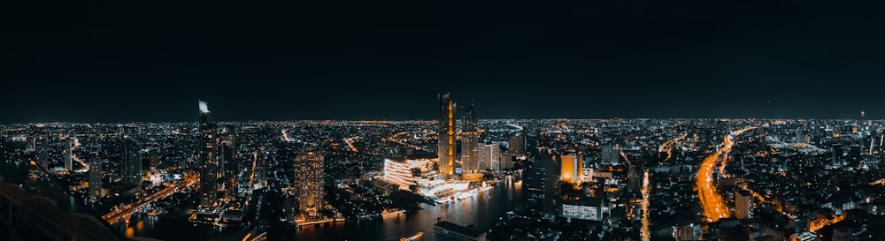 city with high-rise buildings during night time