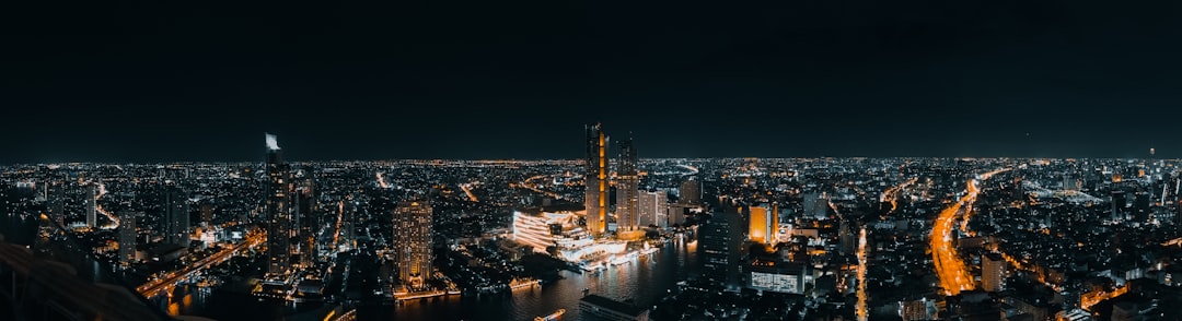 city with high-rise buildings during night time