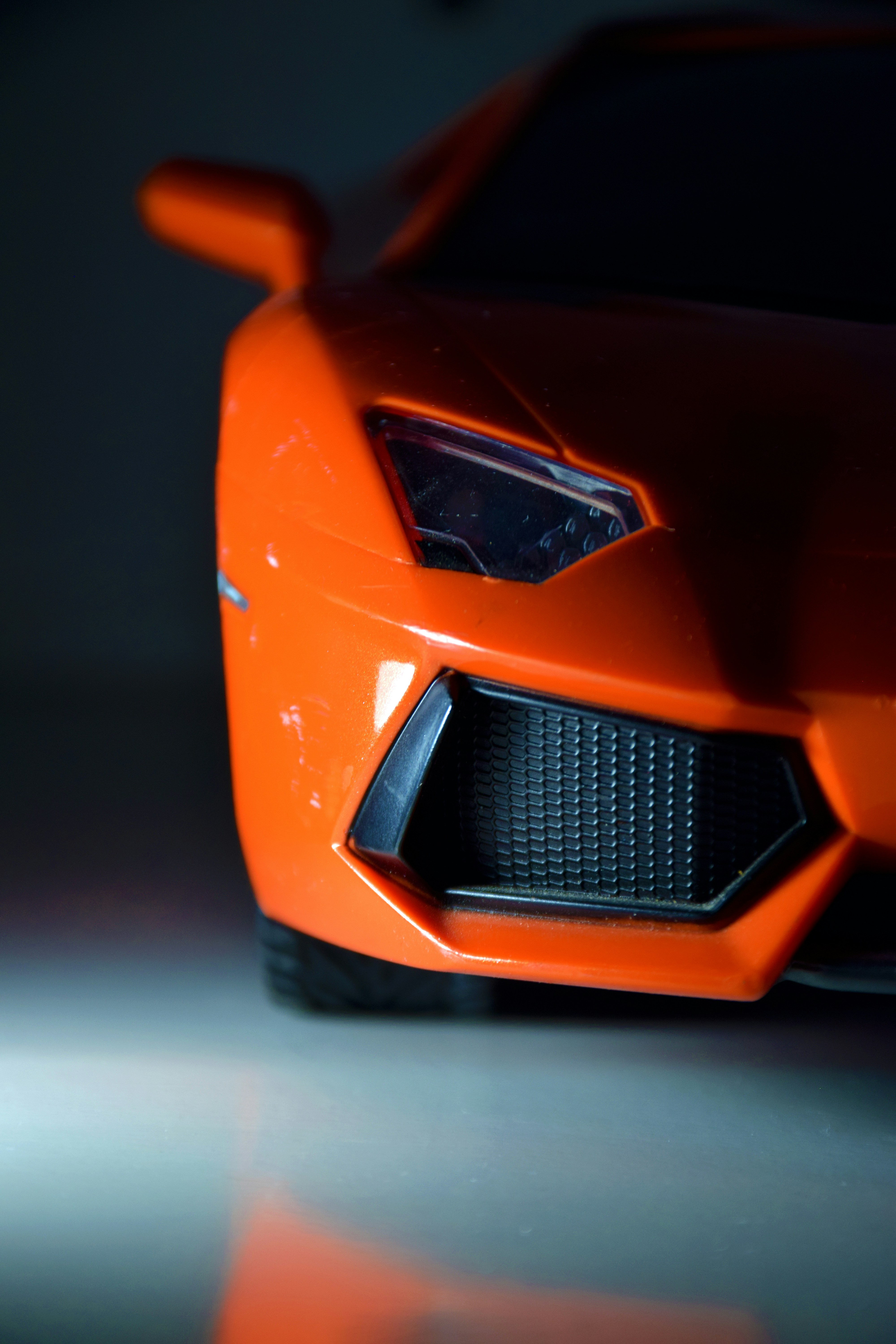 オレンジ色のランボルギーニ アヴェンタドールのクローズ アップ写真の写真 Unsplashで見つけるオレンジの無料写真