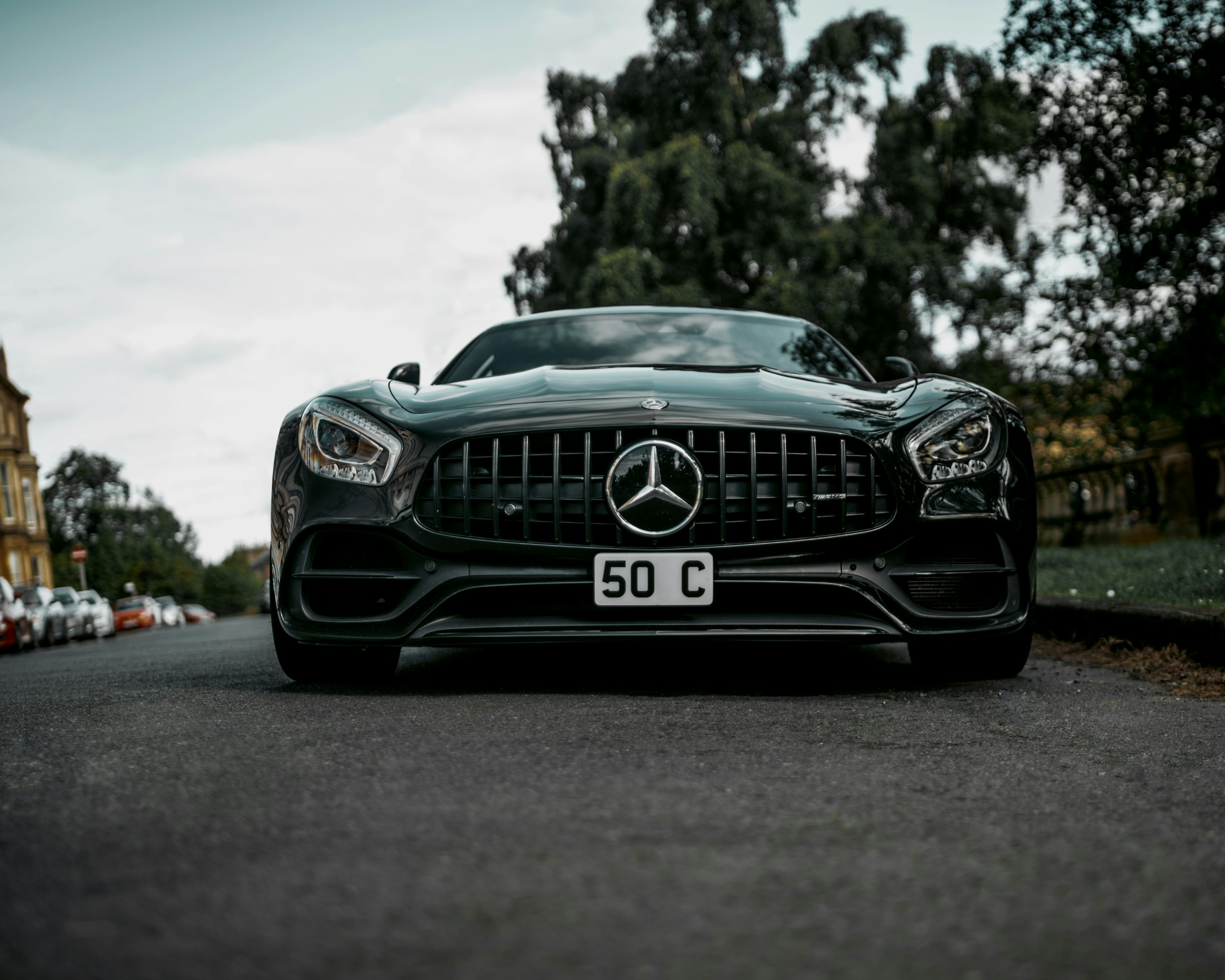 green Mercedes-Benz vehicle