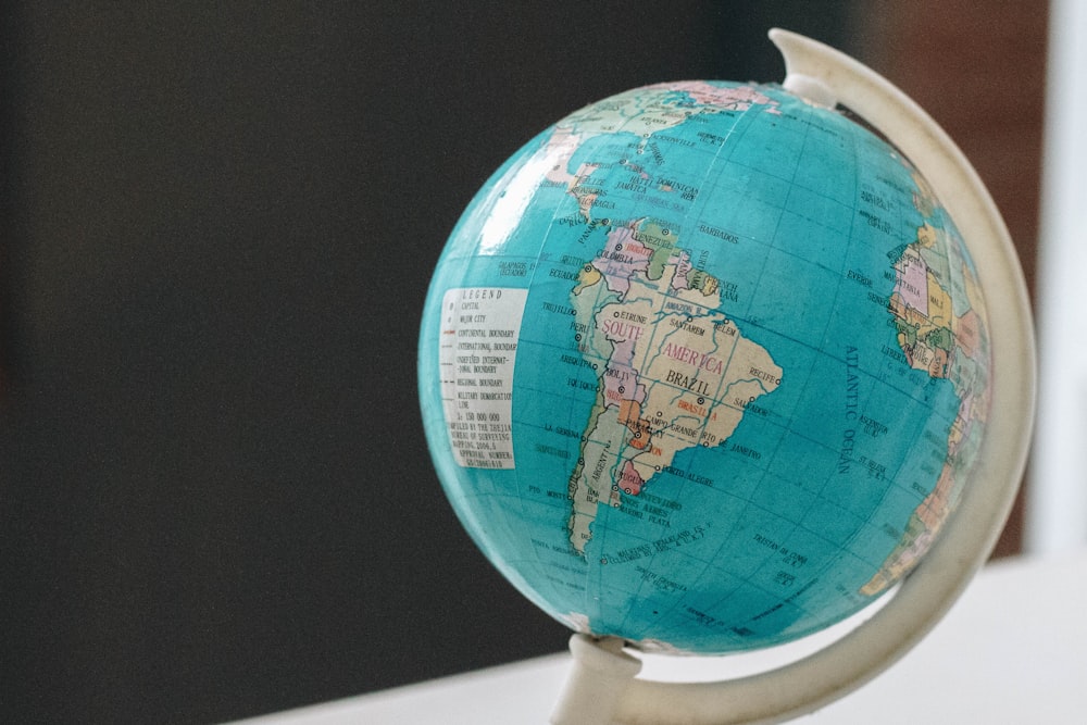 close-up photo of desk globe