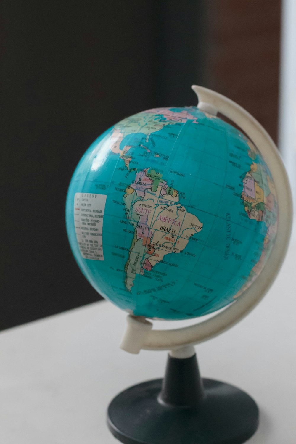 closeup photo of desk globe