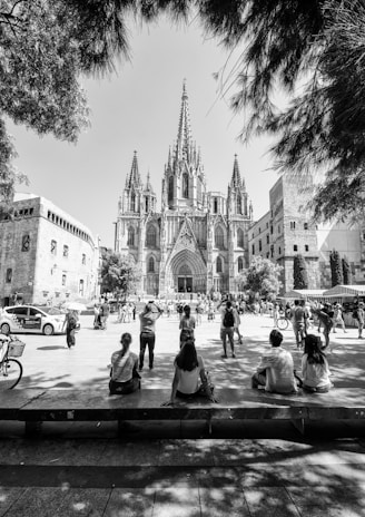 graysclae photo of people facing church